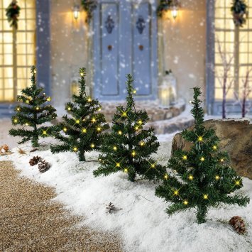 Quatuor de sapins illuminés