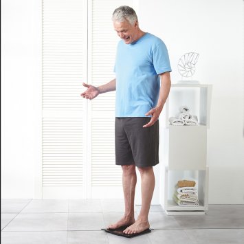 Weegschaal met gewichtsvergelijking