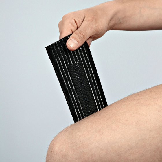 Genouillère avec revêtement antidérapant 