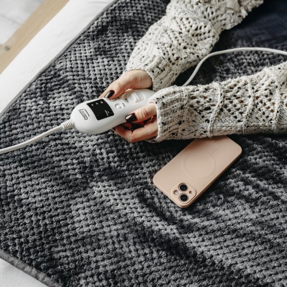 Elektrische verwarmingsdeken opleg 