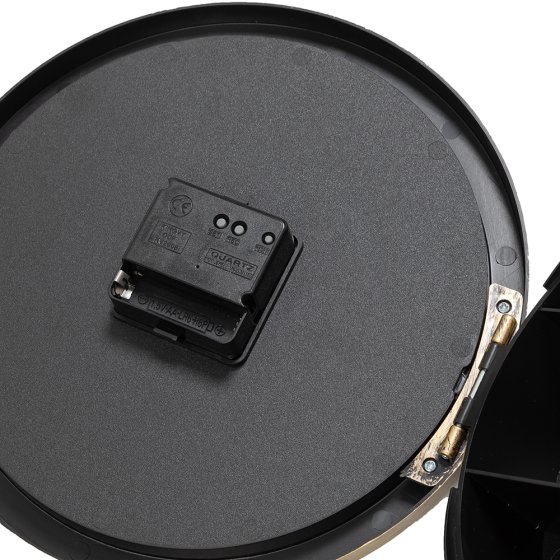 Élégante horloge murale avec compartiment secret 